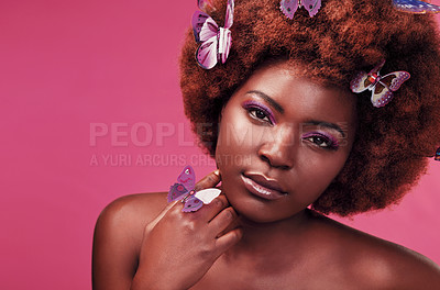 Buy stock photo Portrait, makeup and black woman with butterflies in studio with creative, art and fantasy. Cosmetics, beauty and female model from Nigeria with insects for facial cosmetology by pink background.