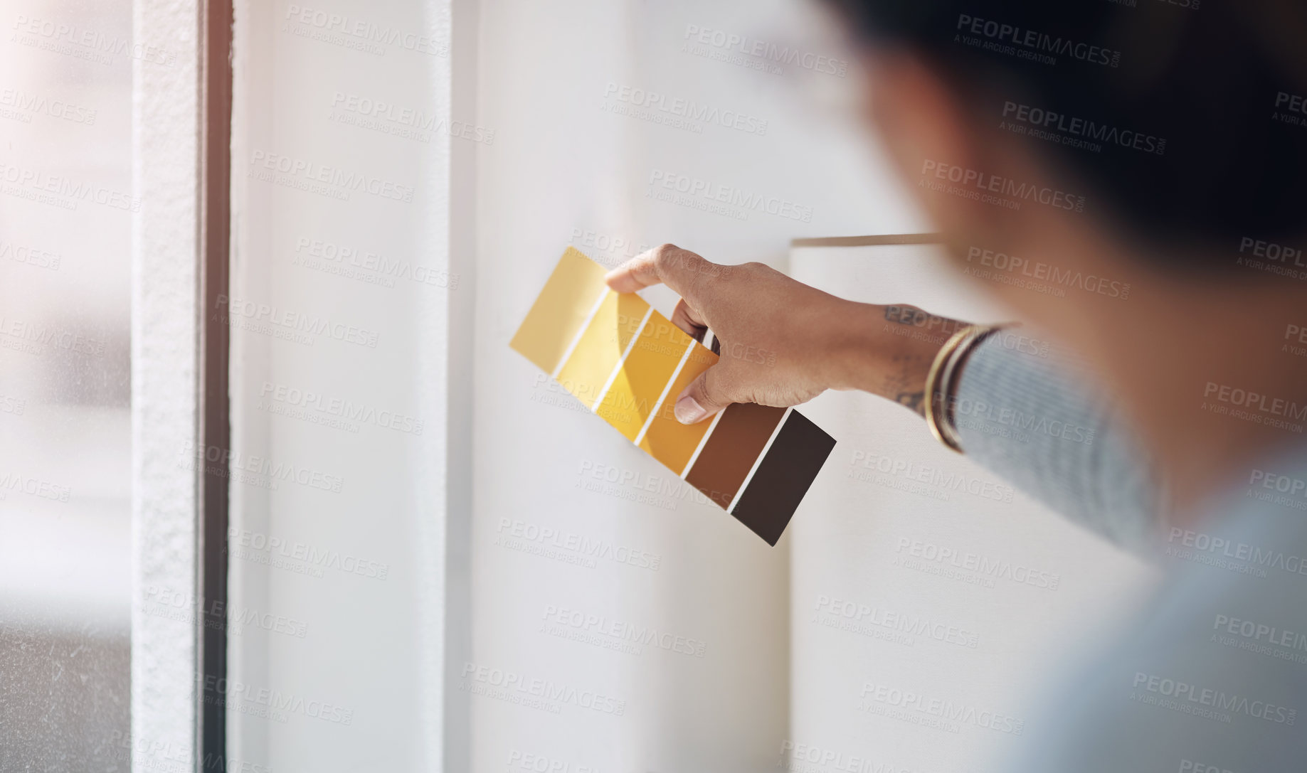 Buy stock photo Person, hands and interior designer with color palette on wall for option, renovation or project at office. Closeup of employee checking swatches or building with shades or sample for DIY improvement