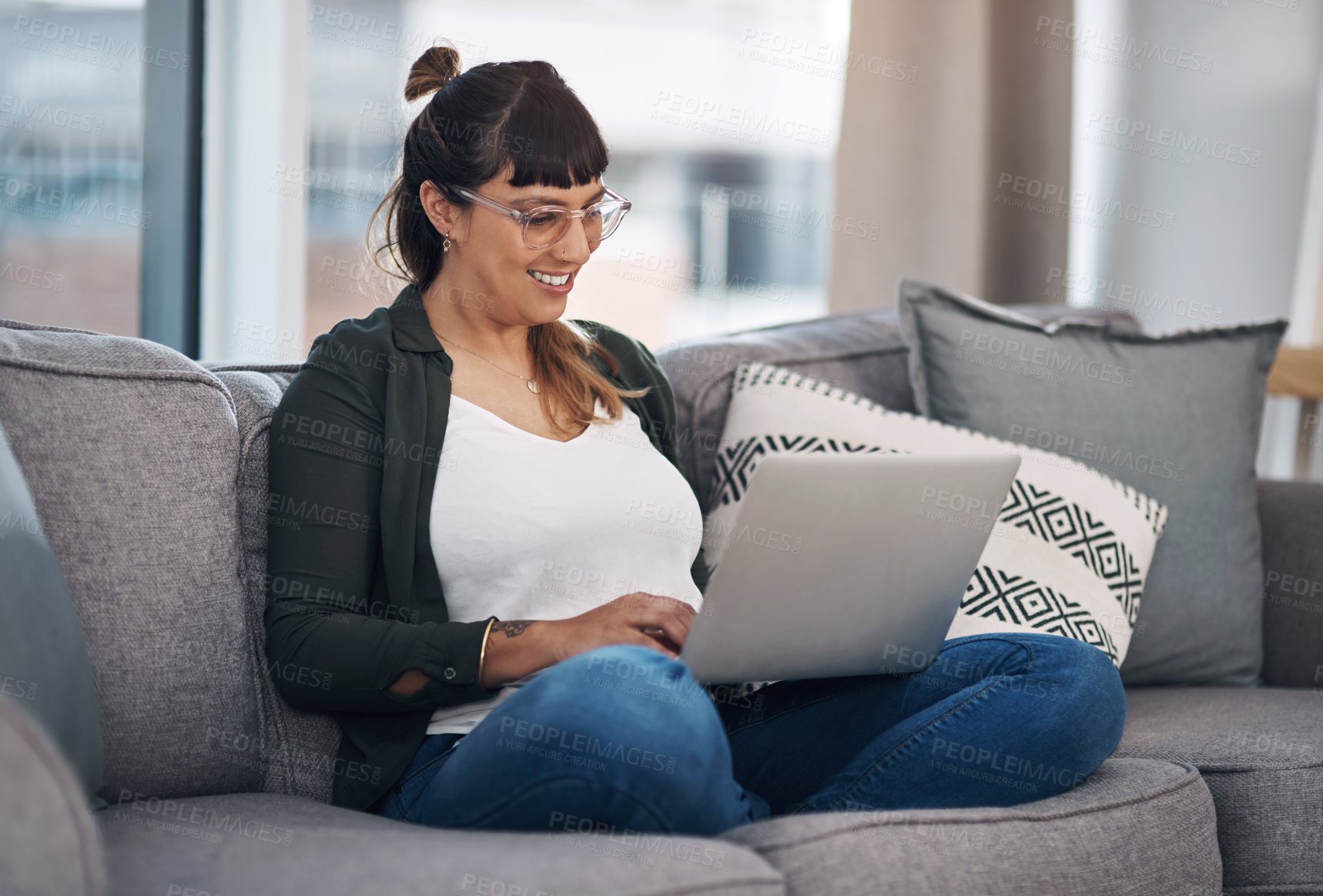 Buy stock photo Happy, relax and woman on sofa with laptop for working from home, freelance job and career. Business, startup and person on computer for typing email, remote work and internet research on website