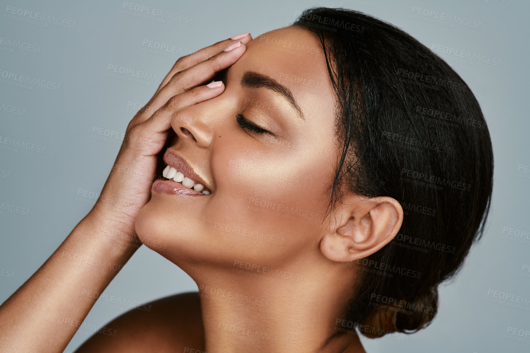 Buy stock photo Laughing, hand or woman with skincare or smile in studio on gray background for smooth face or glow. Facial treatment, happy model or elegant girl with cosmetics, beauty or transformation results