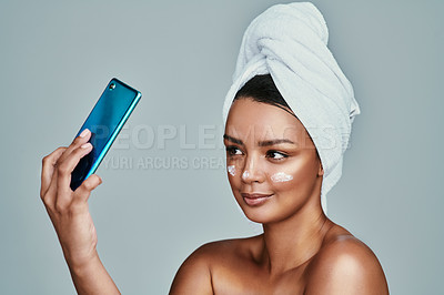 Buy stock photo Selfie, woman or facial with skincare mask or cleaning cosmetics for beauty, review or cream. White background, towel or influencer taking picture of face lotion for antiaging results post in studio