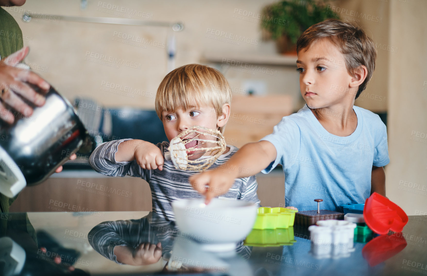 Buy stock photo Boy, children and parent with cooking, mixer and licking batter for cake, dessert or cookies in home. Kids, baking and help with family, bonding and learning with love, care and development in Berlin