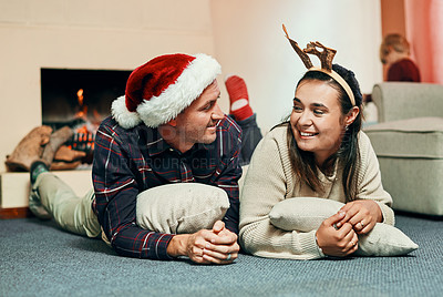 Buy stock photo Shot of a happy young couple spending quality time together at Christmas