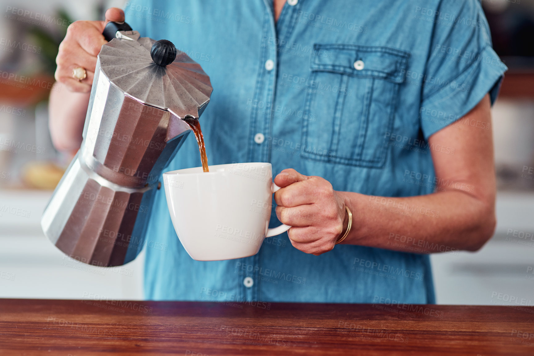 Buy stock photo Mature woman, coffee and mug in kitchen of home, moka pot and smile for morning caffeine. Drink, beverage and warm for comfort and energy for female person, retirement and relax with espresso cup