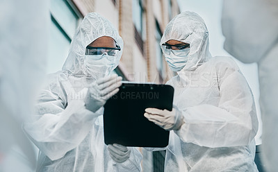 Buy stock photo Hazmat wearing doctor and nurse working as a medical team and healthcare professionals at a quarantine site. Health and safety colleagues in protective gear ready to fight a virus or pandemic
