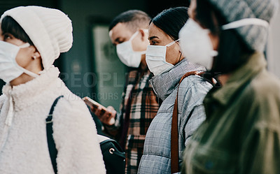 Buy stock photo Traveling people wearing face mask in a covid pandemic in crowd, public or airport border with passport or travel restrictions. Foreigners wearing protection to prevent the spread of diseases abroad