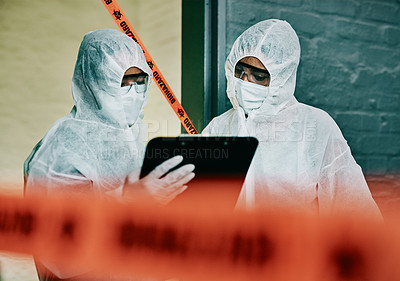 Buy stock photo Covid, corona virus and outbreak healthcare workers inspecting contamination on site with red tape, protective mask and clipboard. Medical doctor or scientist working together during pandemic crisis