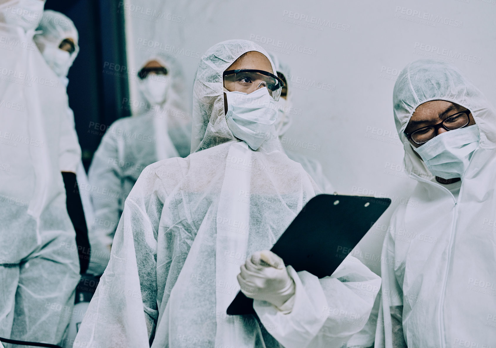 Buy stock photo Doctors, healthcare workers and health team doing inspection, cleaning a building during covid pandemic and checking for danger. Employees wearing masks to protect from virus at a working site