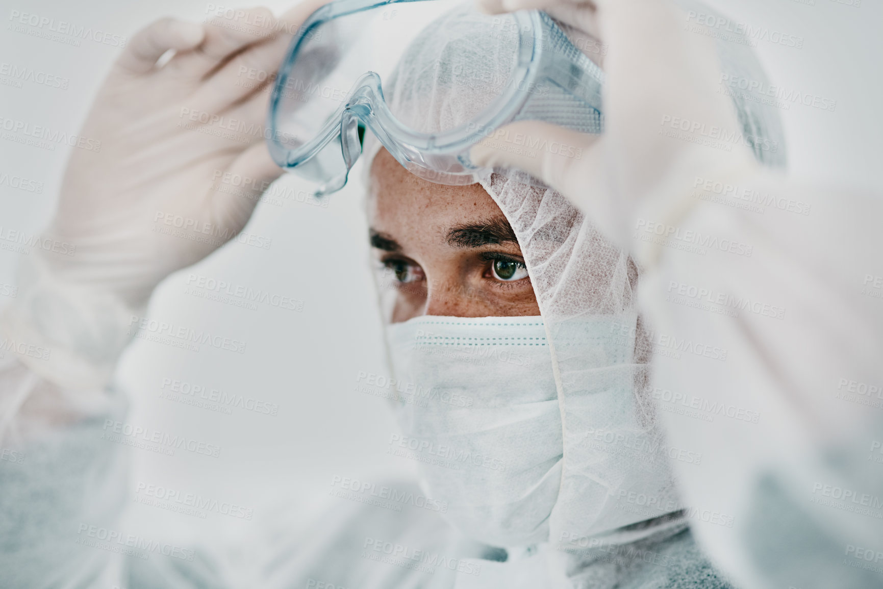 Buy stock photo Man with face mask, goggles and safety from Covid, health policy and protection suit with disinfection. Crisis, healthcare compliance and male medical professional in PPE to protect against corona