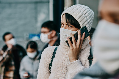 Buy stock photo Covid travel restrictions, refuge and immigration problems at a foreign border with woman on phone call looking worried, concerned or serious. Crowd, queue or line of traveling people at the airport
