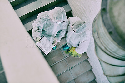 Buy stock photo Medical team and covid hygiene healthcare professionals wearing hazmat suits for safety while working at quarantine site. Above first responders in protective gear to fight virus with innovation