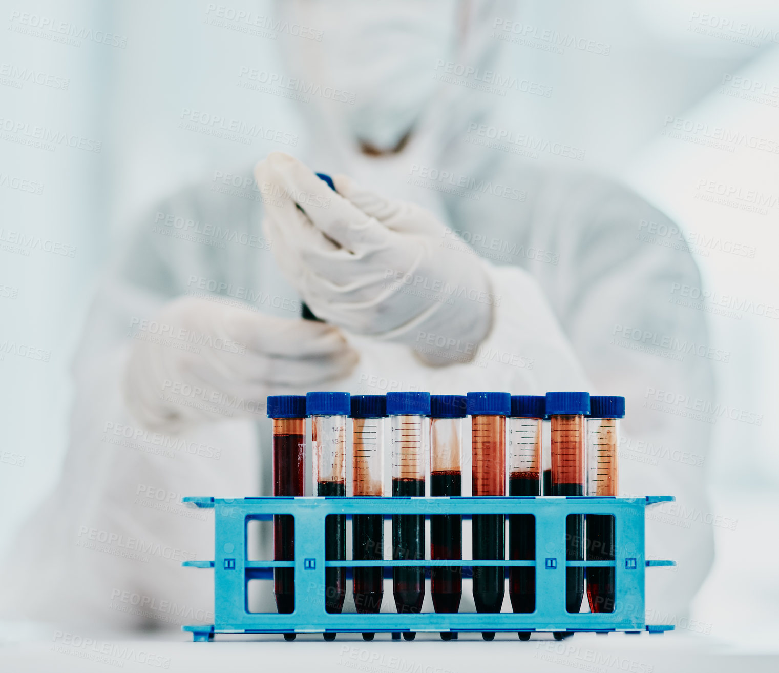 Buy stock photo Cropped shot of a scientist holding a blood sample while conducting medical research in a laboratory