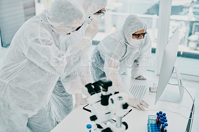 Buy stock photo Group of doctors and scientists using computer for medical research on viruses dressed in hazmat suits, for coronavirus cure. Innovation researchers conducting experiment and waiting for test results