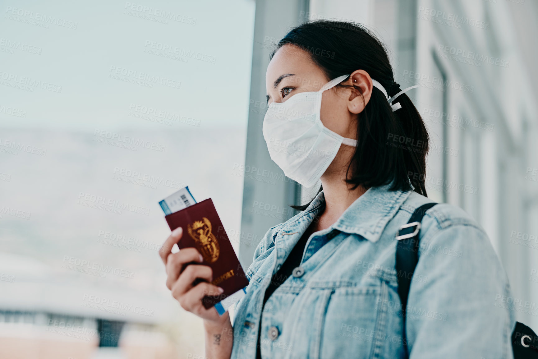 Buy stock photo Woman, airport and face mask with travel protection, safety or PPE for airline policy post covid. Young immigrant with passport, thinking or waiting by window for opportunity or immigration in Europe