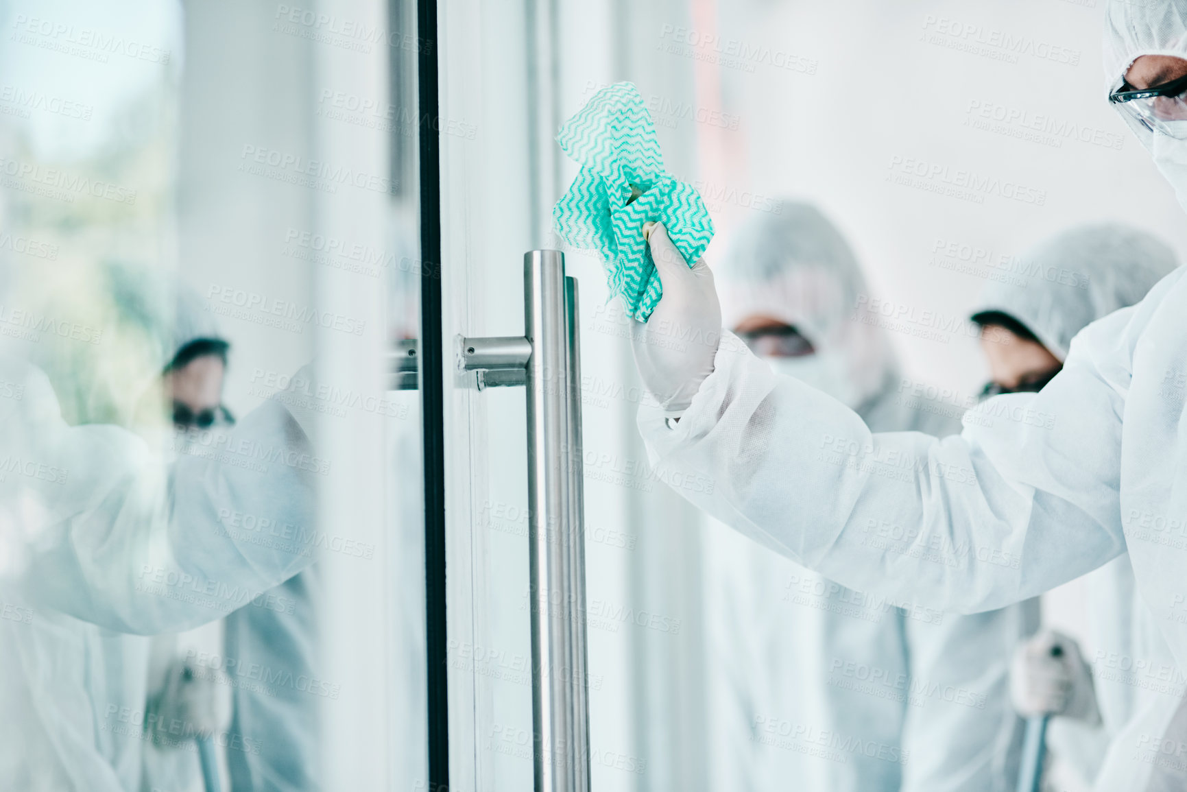 Buy stock photo Covid disinfection, cleaning hospital window with cloth and healthcare compliance for safety and hygiene. Disinfecting glass, people in PPE for protection from corona virus with medical policy