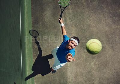 Buy stock photo Man, tennis court and serve in game, sport and above with balance, power and contest at global event. Person, athlete and racket with ball for challenge, competition and start on grass in England