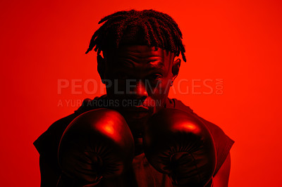 Buy stock photo Man, portrait and gloves in studio for boxing or training for mma competition, workout and professional for performance. Red background, fighter and person for self defense, strength and exercise.