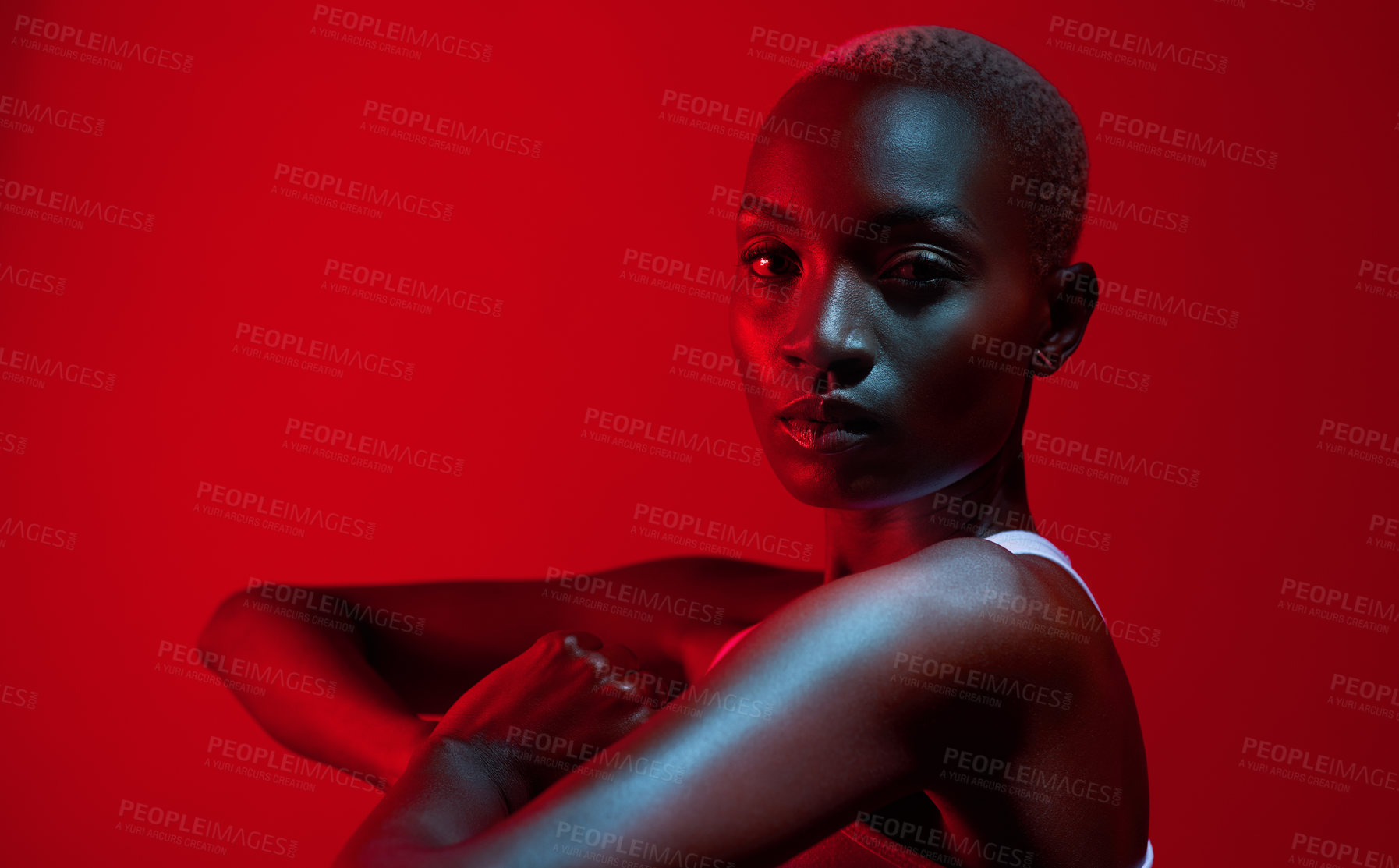 Buy stock photo Warm up, fitness or portrait of black woman on red background for wellness, stretch or glow on studio mockup. Neon aesthetic, female athlete or serious with infrared light for luxury, health or shine