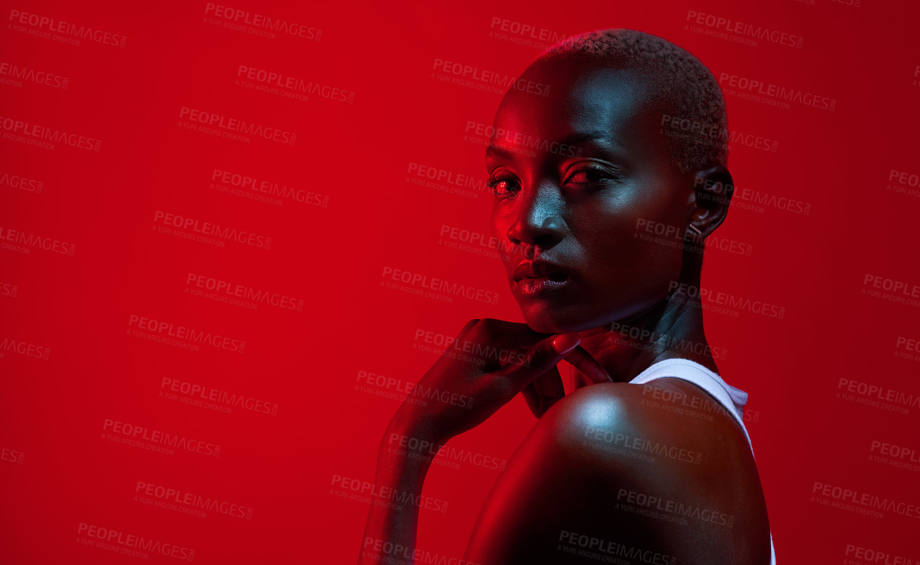 Buy stock photo Red, fitness or portrait of black woman in studio for wellness, self care or glow with background space. Neon aesthetic, female athlete or serious with infrared light for commitment, health or shine