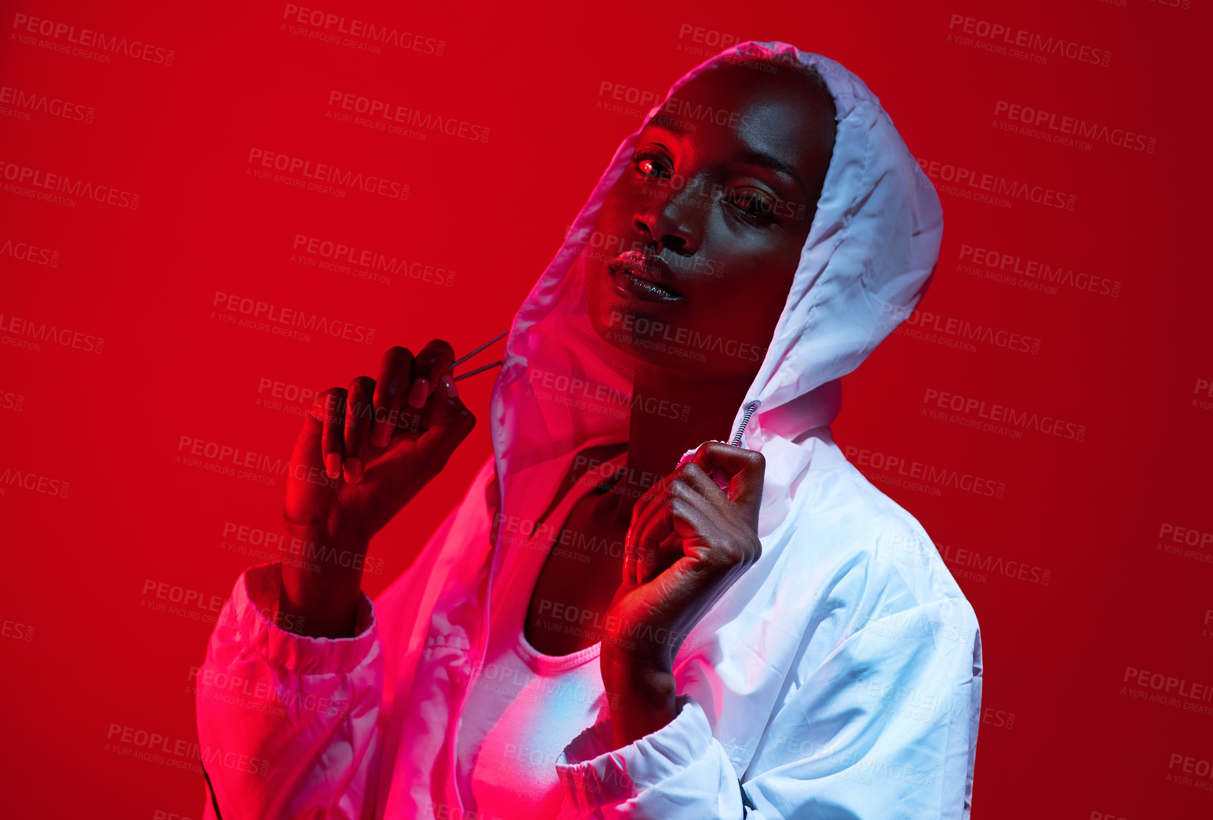 Buy stock photo Hoodie, red light and portrait of black woman with fashion for fitness, athlete or sports. Style, confident and African female person with outfit for athleisure aesthetic by studio background.