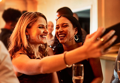 Buy stock photo Girl friends, happy hour and phone selfie of women at a social party and event feeling happiness. Music, woman and smile with a mobile photo ready for dancing and champagne drinking with glasses