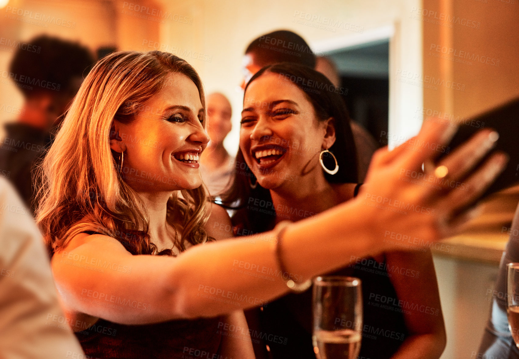 Buy stock photo Girl friends, happy hour and phone selfie of women at a social party and event feeling happiness. Music, woman and smile with a mobile photo ready for dancing and champagne drinking with glasses