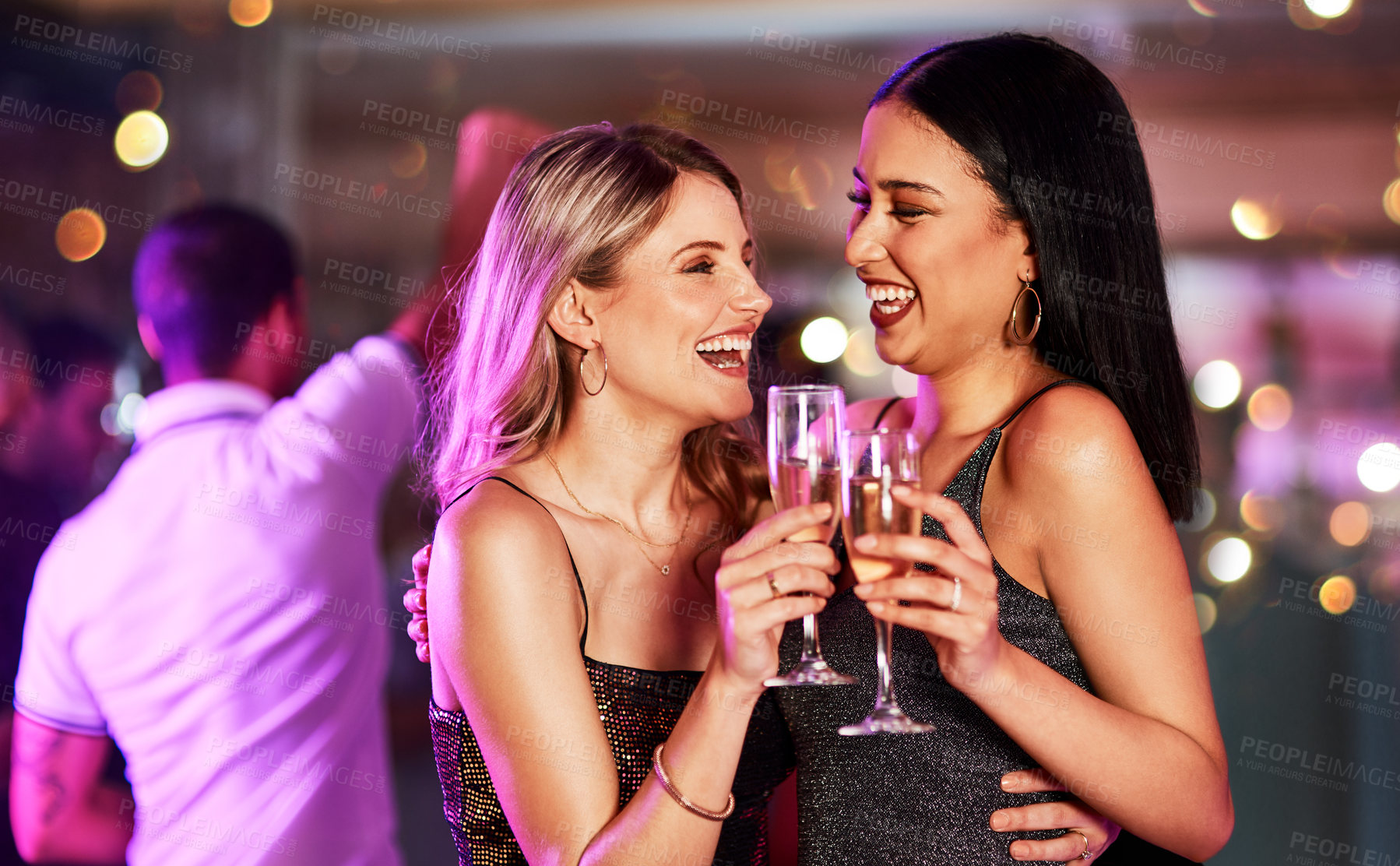 Buy stock photo Party, champagne and lesbian couple toast at nightclub, having fun and bonding. Celebration, cheers and happy women with wine or alcohol at new year event, laughing or enjoying quality time together.