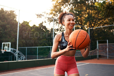 Buy stock photo Woman, sport and ball on basketball court as athlete or player for challenge as ready for training. Female person, warm up and outdoor for competition, match and game in physical activity or exercise