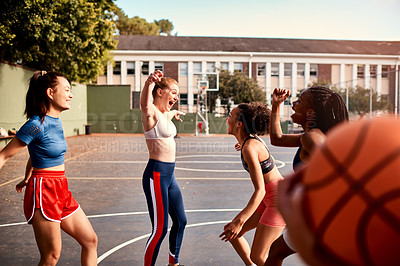 Buy stock photo Outdoor, group and celebration for win, women and victory for team, basketball court and excited for game. Fitness, success and people with ball, sport and friends in weekend, fun or college students