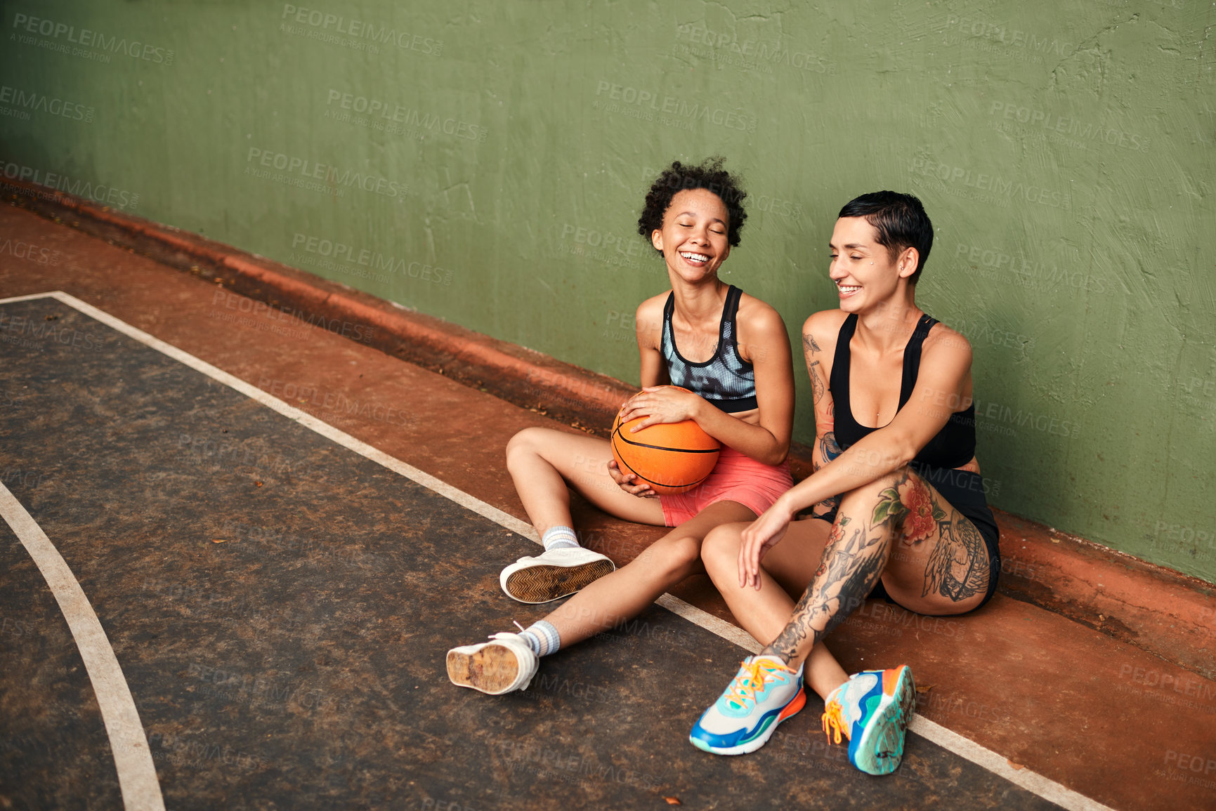 Buy stock photo People, break and basketball team for conversation, outdoor and support players on sports court. Women, communication and plan for game strategy on playground, together and relax at fitness training