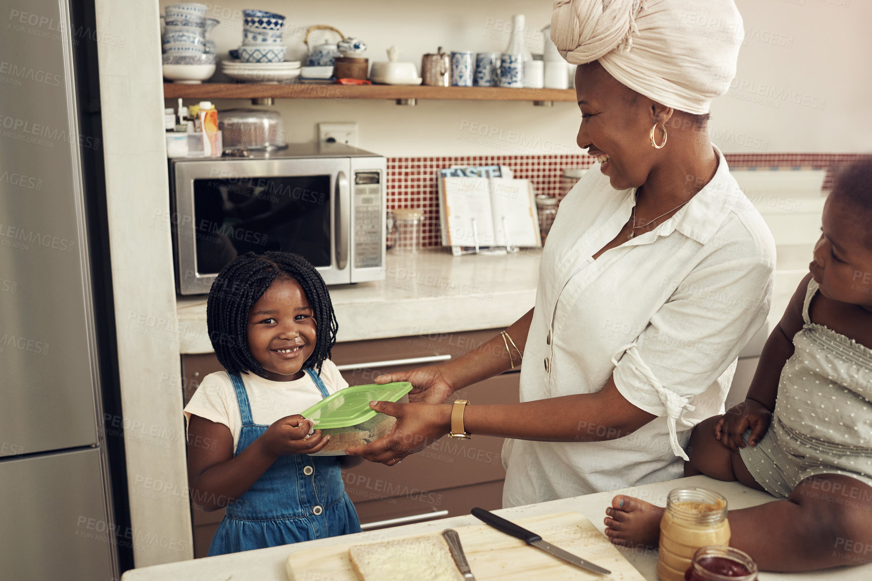 Buy stock photo Black family, mother and child portrait in kitchen with diet nutrition, bonding and lunchbox in home. African mama, young girl and smile with container for food storage, lunch meal and parent support