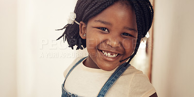 Buy stock photo Portrait of an adorable little girl feeling cheerful and happy at home