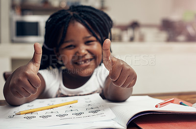 Buy stock photo Black girl, portrait and thumbs up for education in home, homework and approval for learning. Female person, book and writing in kitchen for knowledge or information, satisfaction and development