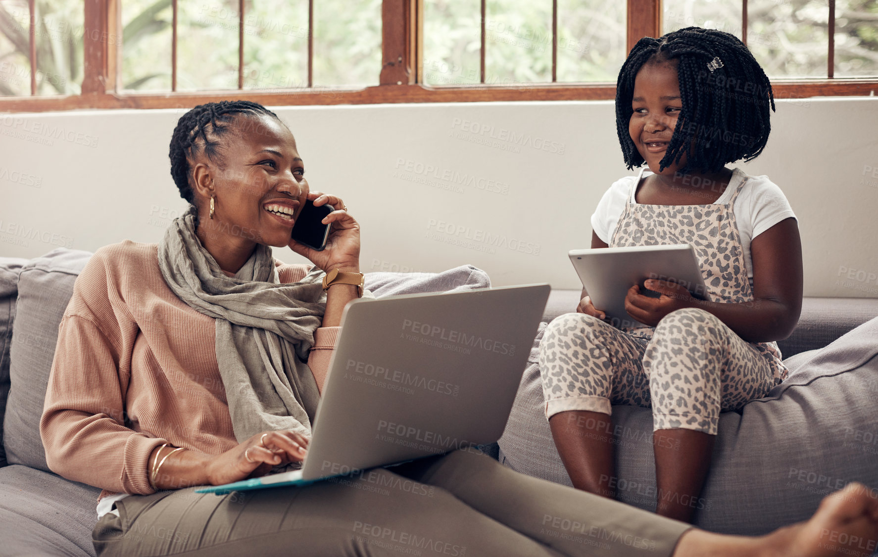 Buy stock photo Black family, freelance call and kid smile with tablet and mom on a computer with remote work. Happy, child app and home of a girl with mama in a conversation and communication from freelancer job
