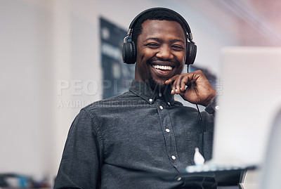Buy stock photo Cropped portrait of a handsome young male architect smiling while sitting in a modern office