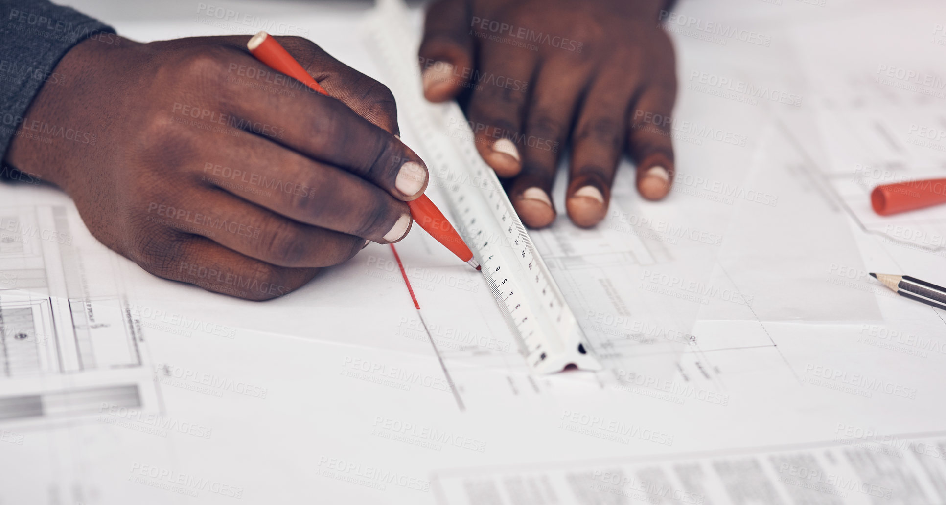 Buy stock photo High angle shot of an unrecognizable male architect making some measurements on his blueprints in a modern office