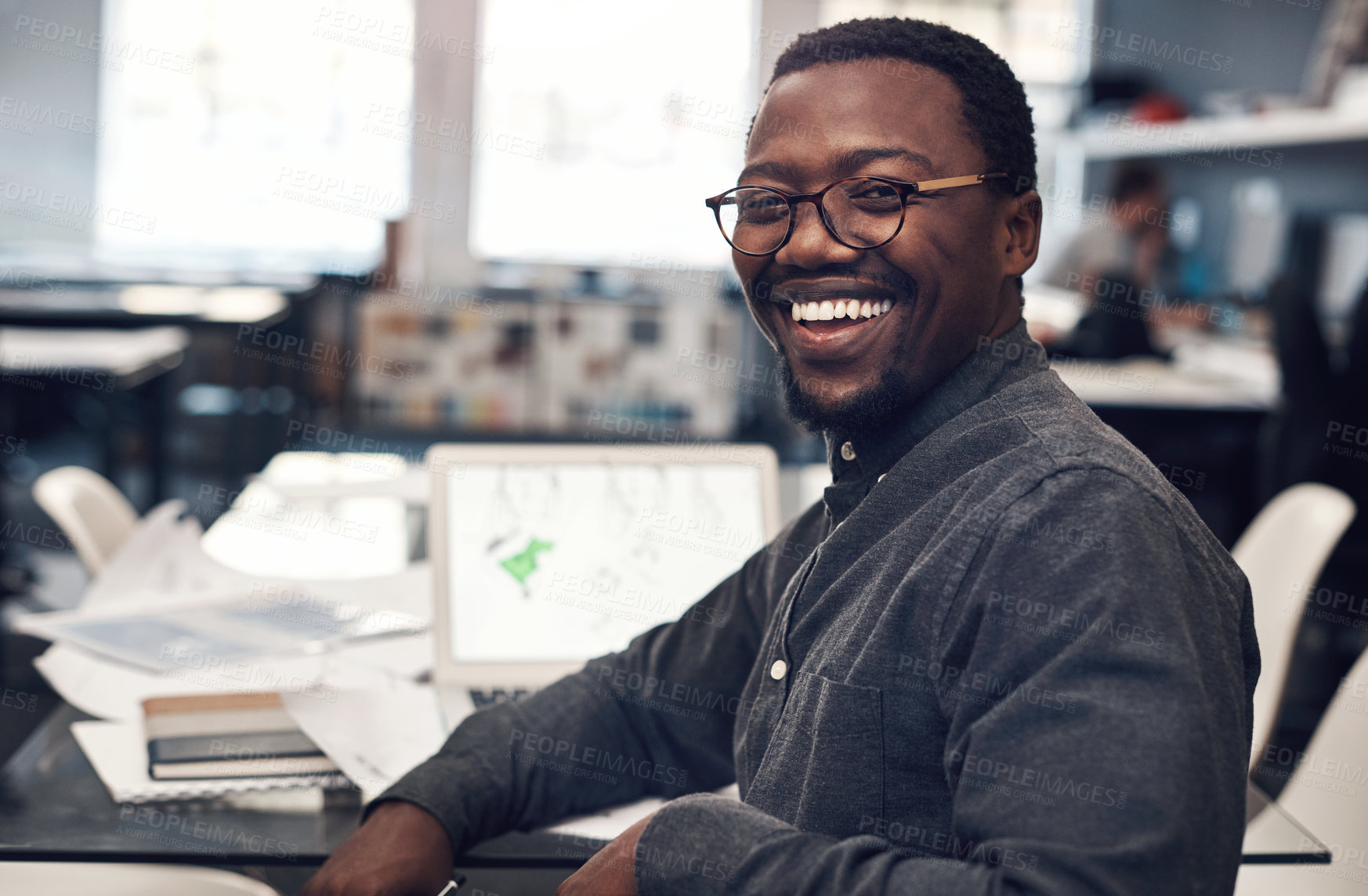 Buy stock photo Black man, portrait smile and laptop by desk for startup, construction business and research in office. African architect, entrepreneur and computer for email, rendering software and property design