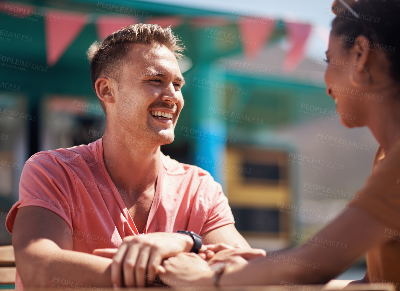 Buy stock photo Couple, holding hands and smile with happy conversation at harbor, vacation or date by waterfront in summer. Man, woman and listening with care, romantic bonding or love by sea for outdoor holiday