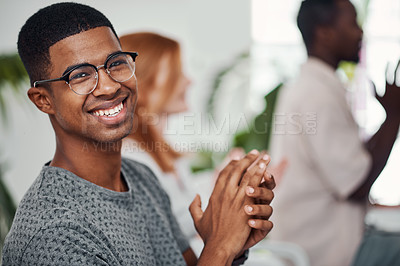 Buy stock photo Portrait of a young businessman applauding during a conference