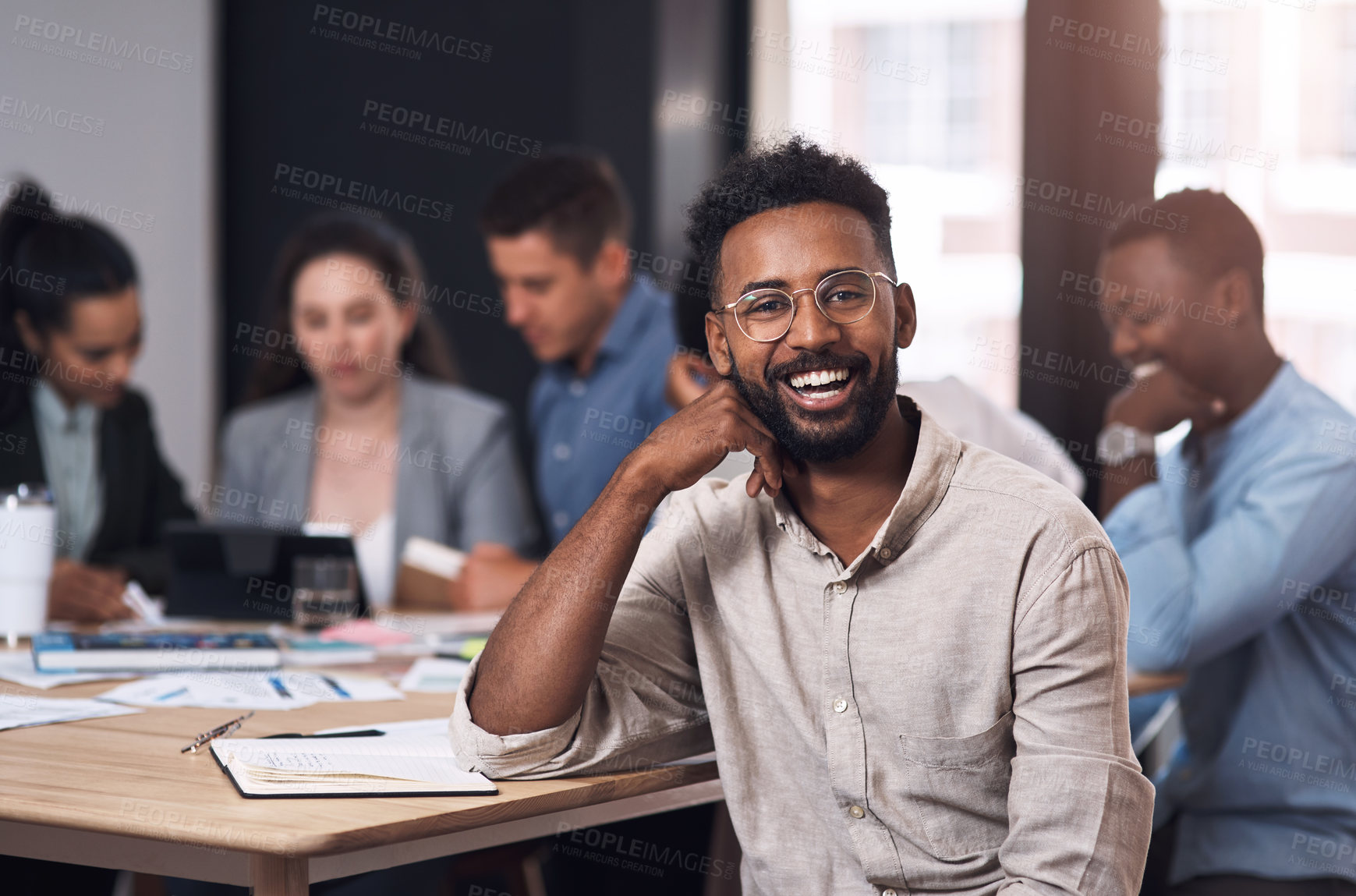 Buy stock photo Businessman, happy portrait and meeting with teamwork for growth report, paperwork and feedback in office. Male employee, smile and collaboration with project documents, strategy plan and discussion