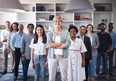 Buy stock photo Portrait of a diverse group of businesspeople standing together in an office