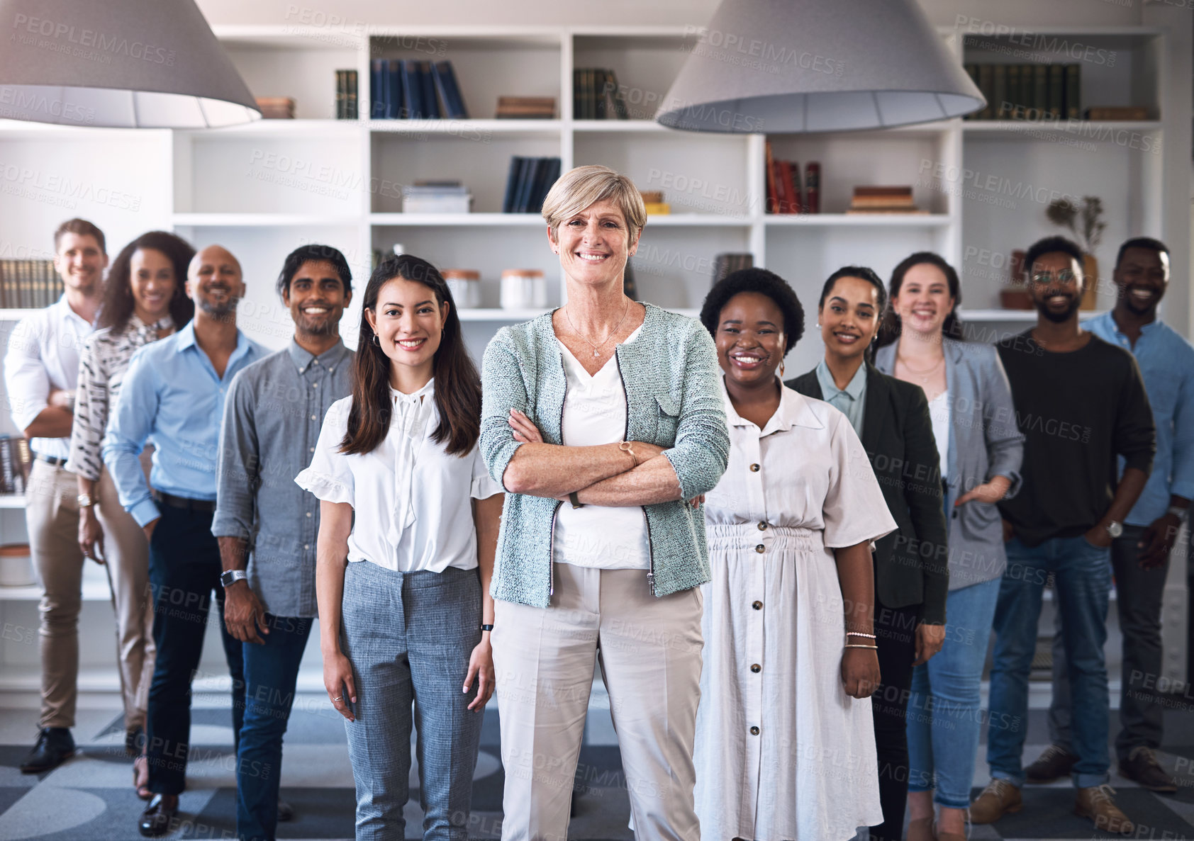 Buy stock photo Portrait of a diverse group of businesspeople standing together in an office