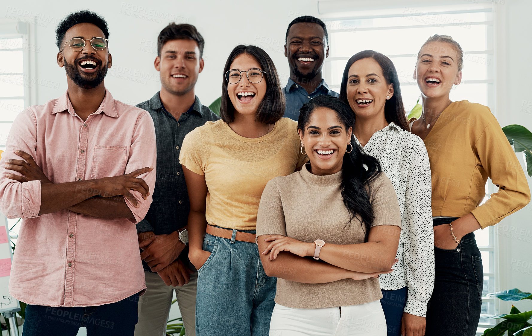 Buy stock photo Cropped portrait of a diverse group businesspeople standing together after a successful discussion in the office