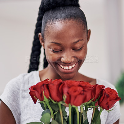 Buy stock photo Happy, roses and black woman with gift in home for anniversary or valentines day celebration. Love, smile and African female person with bouquet of red flowers for romantic present at apartment.