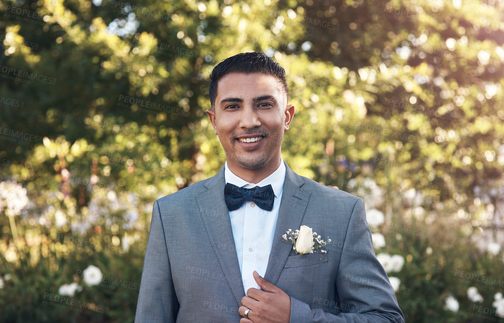 Buy stock photo Cropped shot of a a handsome young bridegroom standing outside
