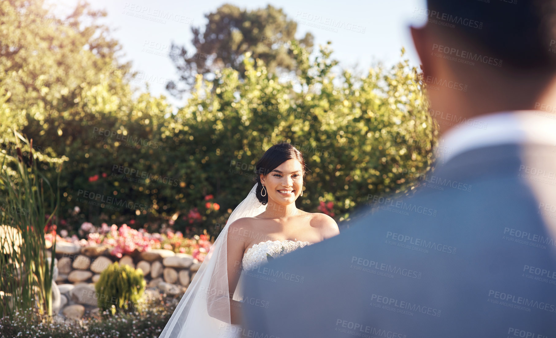 Buy stock photo Cropped shot of a happy bride looking at her groom