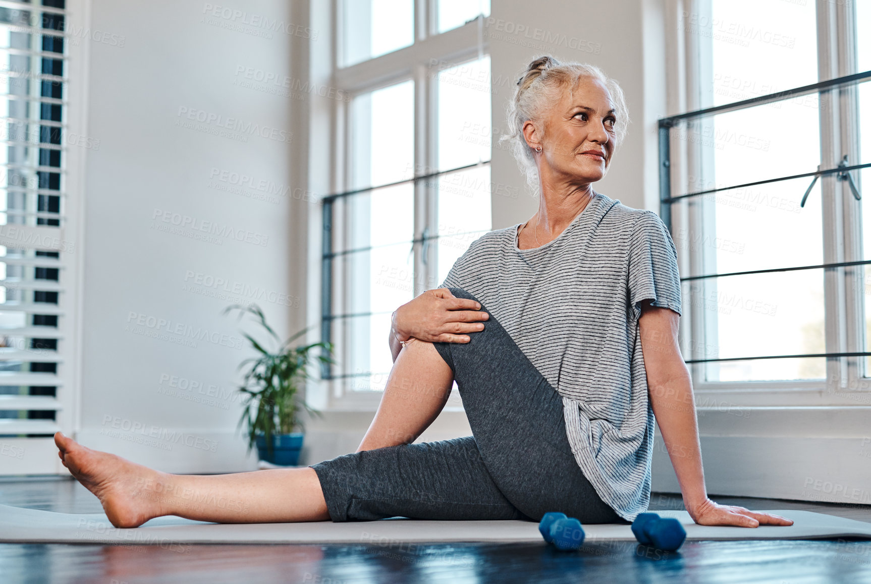 Buy stock photo Yoga, mature woman or stretching in home for tension release, wellness or peace. Pilates session, female person or thinking on floor for flexibility, healthy body or routine in living room in morning