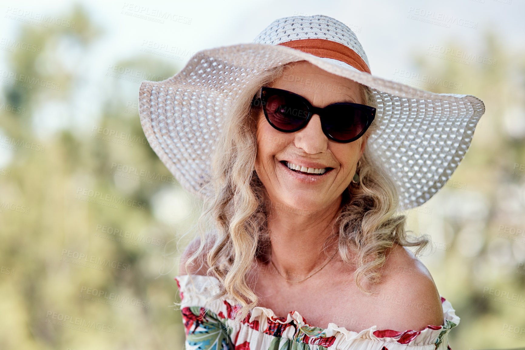 Buy stock photo Fashion, portrait and sunhat with happy old woman outdoor for holiday, travel or vacation. Face, smile and sunglasses with senior person on weekend getaway to relax in summer for retirement trip