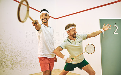 Buy stock photo Funny, squash court and men with training, silly and expression with goofy pose, happiness and healthy. People, friends and players with rackets, fun and fitness with hobby, recreation and activity