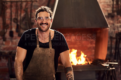 Buy stock photo Portrait of a handsome young metal worker working inside a welding workshop
